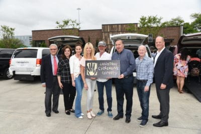 HCC President & CEO, Laura Ward, alongside long-time HCC friend Patrick Fertitta proudly introduced each van recipient while presenting the keys to the individual family’s brand-new van.